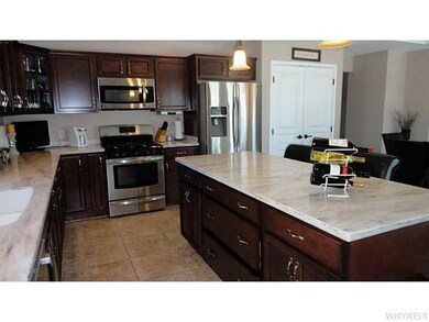Kitchen. Look at this work area! Corian counters a
