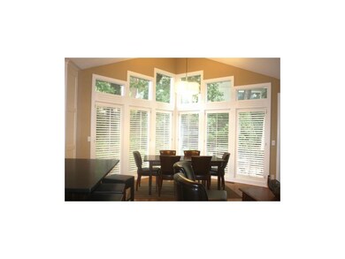 Breakfast room has stunning floor to ceiling windo