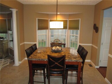 formal dining room, open to the living room and ha