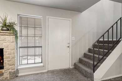 This two level condo has a living room, dining roo