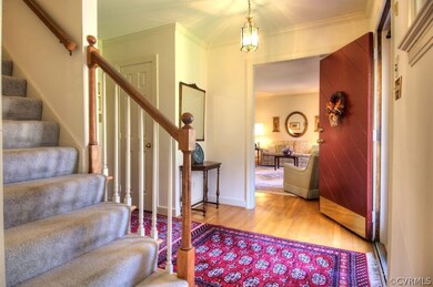 Beautiful foyer with hardwood floors.