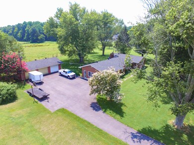 3 car detached garage, blacktop driveway with ample parking space 