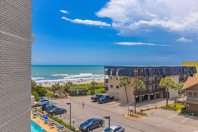 Property view of water with a beach view