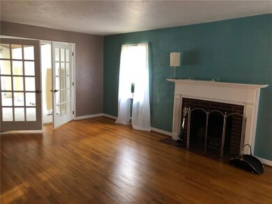 Another view of the living room with french doors 
