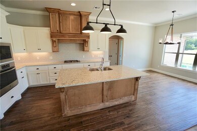 NOW WE ARE COOKING IN THE WIDE OPEN KITCHEN WHERE THE COOK WILL NEVER MISS ANYTHING.