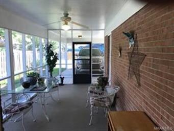 Screened in patio, looking from the breakfast area