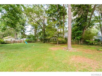 EXTERIOR BACK W/ DECK & LARGE FENCED-IN YARD