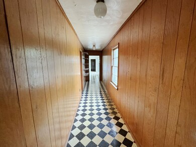 Corridor with wooden walls