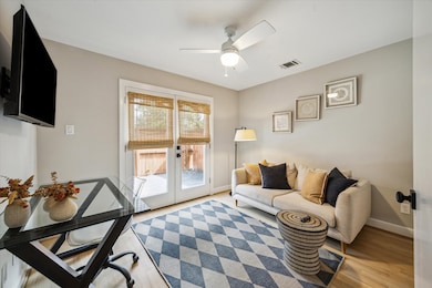 Bedroom #2 with French door access to the outdoor