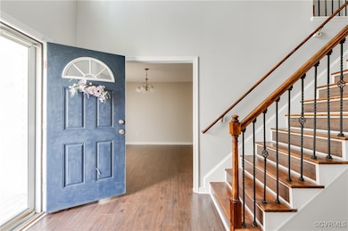 Entryway featuring laminated floors