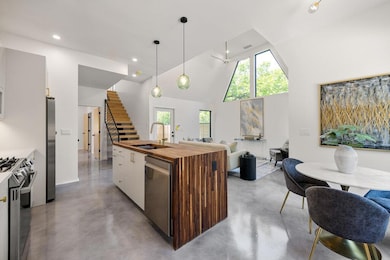 Kitchen featuring appliances with stainless steel