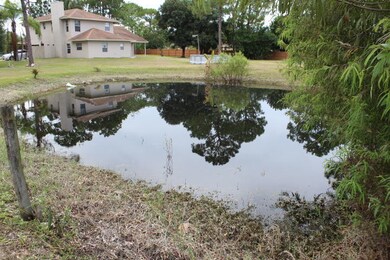 Pond at far edge of Property