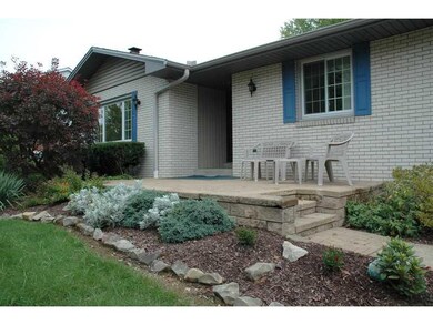 Exterior Front. New Front Patio, Walls and Steps -