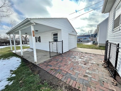 Detached garage and patio.