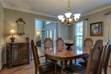 Diningroom off the Foyer with hardwood floors