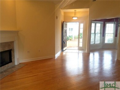 Great room open to separate dining room.
