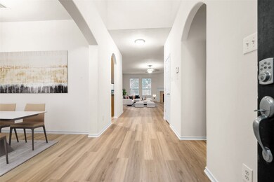 This home boasts rich wood flooring throughout, ac