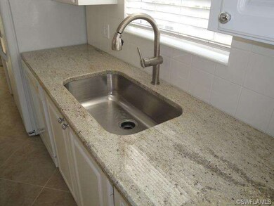 Kitchen with New Stainless Sink and Faucet