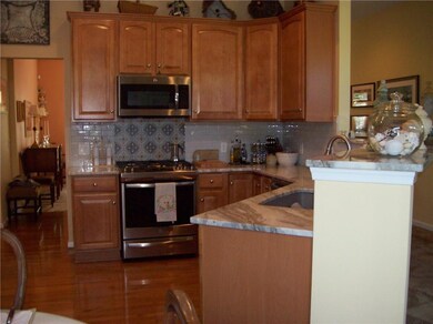 SPARKLING REMODELED MAPLE CABINETRY , GRANITE COUN