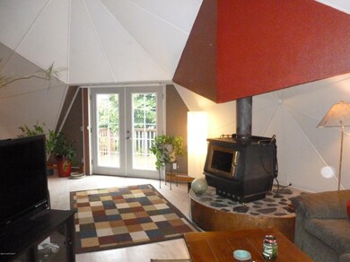 Woodstove, french doors to view deck!
