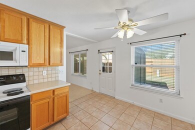 Further into the kitchen, the breakfast nook windo