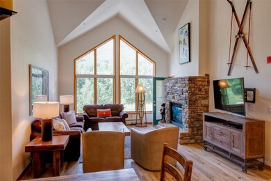 Living room featuring light wood-style flooring, a