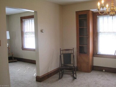 Formal Dining Room with built in cabinets.