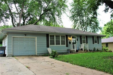 Front view, one garage, double parking spaces.
