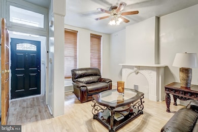 1818 N Caroline St, Baltimore, MD 21213 - photo 4