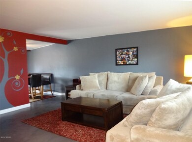 Living room and dining from entry area