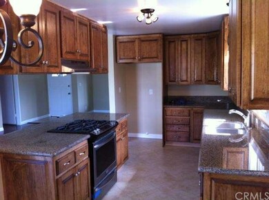 NEW GRANITE COUNTERS, NEW CUSTOM CABINETS AND BRAND NEW APPLIANCES 