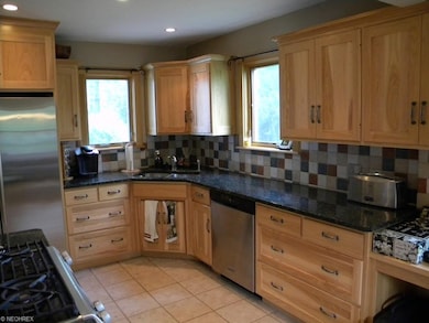 Tiled backsplash adds a colorful accent!
