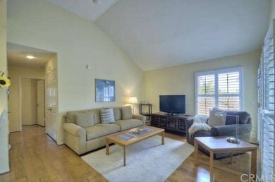 Sunlit Living Room With Custom Hardwood Flooring