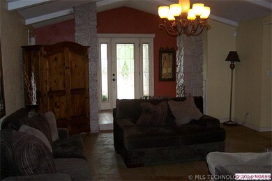 Large living room with etched, stained concrete fl