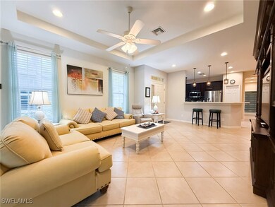 Living room with a tray ceiling.