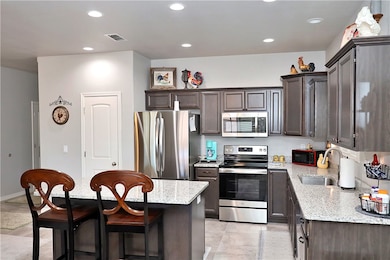 Kitchen with stainless steel appliances, an upgrad