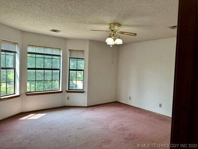 Primary bedroom with bay window