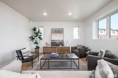 Seamless flow from kitchen to dining makes hosting dinners (and daily life) a breeze. *Model Home Photo