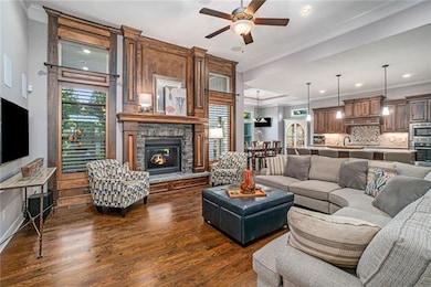 Beautiful great room with see-thru fireplace to sc