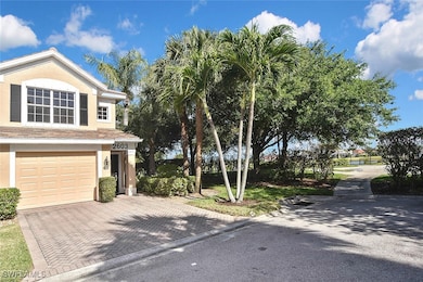 View of property exterior featuring a garage, stuc