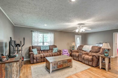 Wood Flooring - ceiling fan - open plan
