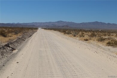 County maintained road with view of mountains.