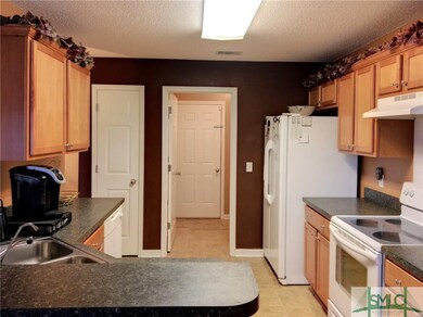 Lovely cabinets, counters, and plenty of storage w