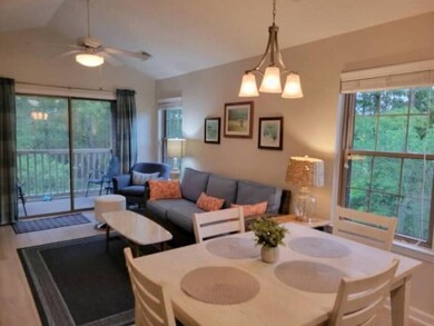 Dining area with hardwood / wood-style floors, cei
