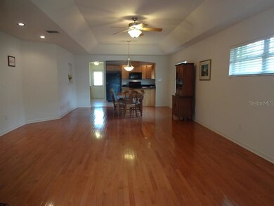 Great room. View from the front door. Wood floors,