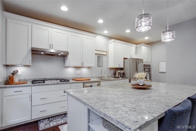 Kitchen with appliances with stainless steel finis