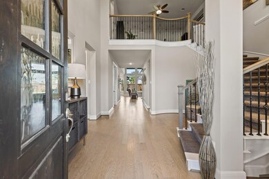 This is a spacious, well-lit entryway featuring a
