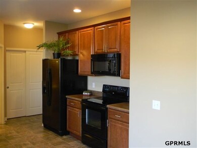 beautiful with maple cabinets and black appliances.  Refrigerator, microwave, dishwasher and stove all included.