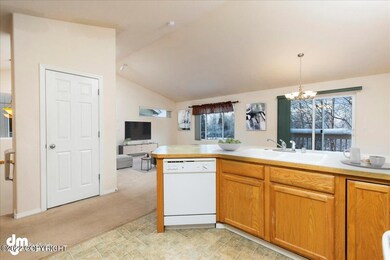 Kitchen with pantry and open to living a
