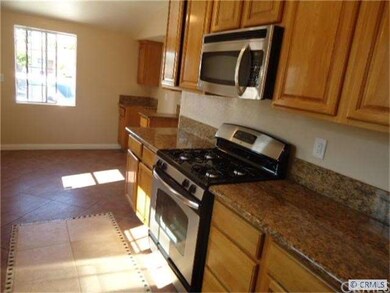 Large eat in kitchen with stainless steal applianc